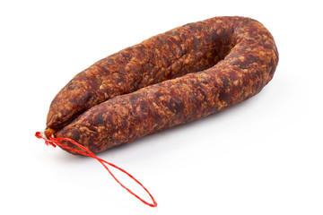 Dried pork sausage, smoked meat, close-up, isolated on white background