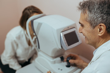 eye examination in optic store