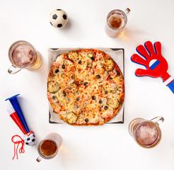 Photo from above of glasses with beer, pizza, pipes