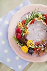 raw vegan cake with fruits and seeds