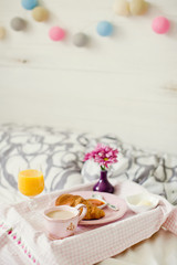 Obraz na płótnie Canvas french breakfast on the bed