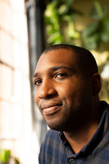 Close up of smiling thoughtful man