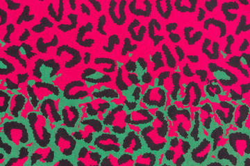 Abstract colorful leopard unreal and futuristic print. Composed from pink green and black.