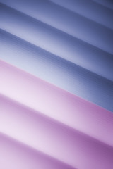 Elegant striped blue and purple background pattern fading into white space