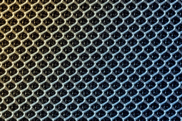photo of textured surface of uniformly distributed grid pattern similar to chain fastening in multiple magnification. texture, toned, instagram and close-up
