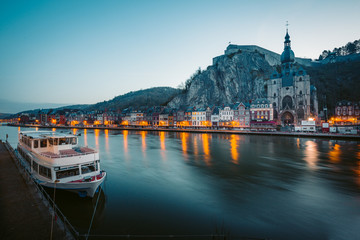 Fototapeta premium Historic town of Dinant with river Meuse at night, Wallonia, Belgium