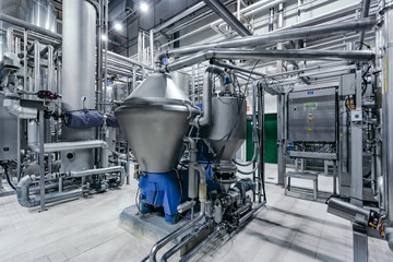 Modern brewery production line. Beer filtration equipment and pump machinery