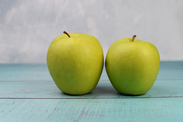 green apples on wooden ona for healthy eating