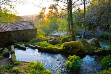 Fototapeta na wymiar Cascada con molinos de agua. Caldas de Reis. Galicia. España.