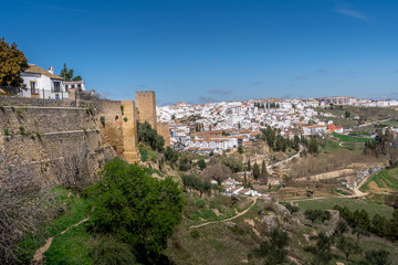 Fototapeta na wymiar Ronda Spain medieval hilltop town surrounded by walls and towers with famous bridge over gorge