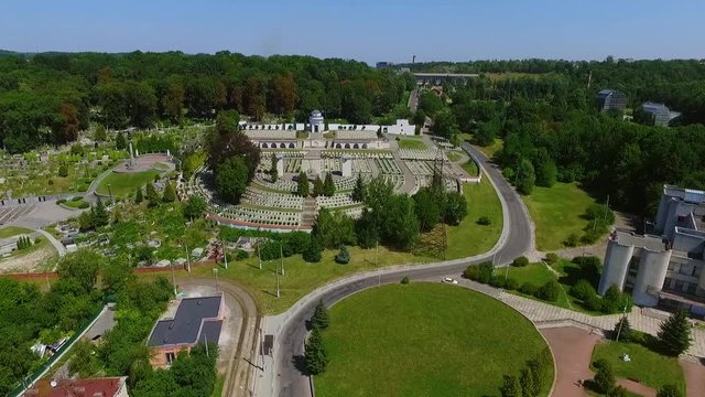 Aerial drone footage of pompous luxurious chapel surrounded with classical antique gardens, cemetery. Landscape designing, gorgeous, peace. White, sunny weather