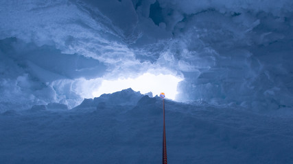 Abseiling in a crevasse in Antarctica