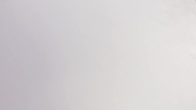 US 100 dollar bills being exchanged between hands