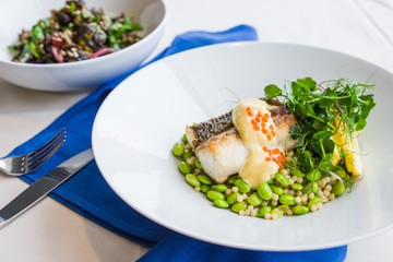 Grilled Trout with roe, pea shoots, edamame and sauce