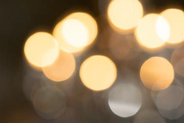 gold background of defocused abstract lights. golden bokeh lights.