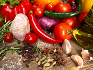 Fresh vegetables bell pepper, hot pepper, tomatoes, spices, olive oil