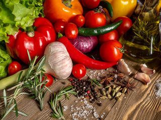 Fresh vegetables bell pepper, hot pepper, tomatoes, spices, olive oil