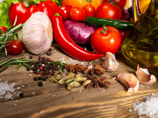 Fresh vegetables bell pepper, hot pepper, tomatoes, spices, olive oil
