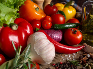 Fresh vegetables bell pepper, hot pepper, tomatoes, spices, olive oil