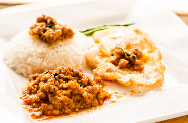 Panaeng  curry  with egg and rice in plate, Thai famous food