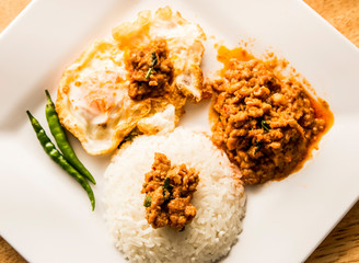 Panaeng  curry  with egg and rice in plate, Thai famous food
