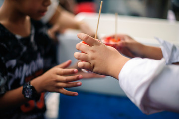 Charity food : Feeding the poor to hands of a beggar. Poverty concept