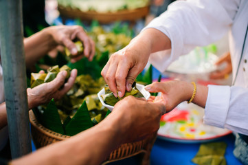 Charity concept : Feeding the poor to help each other in society.