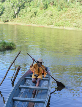 Woman in a boat, Kenya
