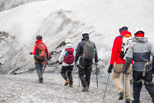 Group of tourists heading to the guided tour on Solheimajokull glacier, Iceland	