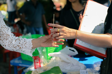 Charity concept : donate food to the beggar.