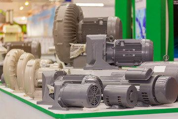 many type of new electric motor and blower on table