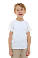 Emotional little boy in a pure white t-shirt.