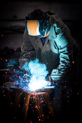 Fototapeta premium industrial worker welding