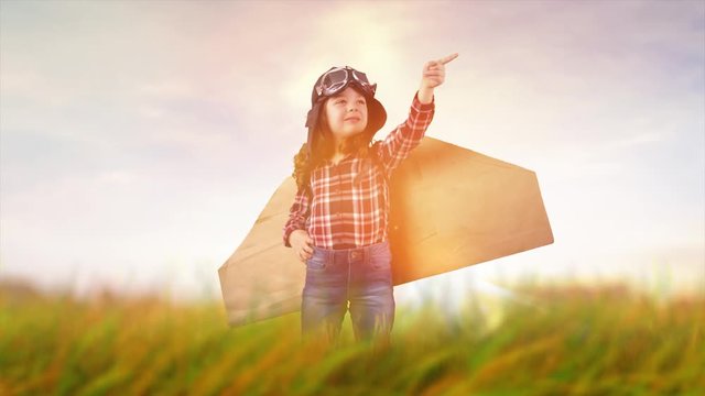 Conceptual footage of a little pilot - girl