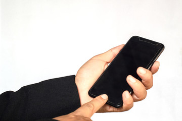 Male hand holding a  smartphone on white background, business concept.