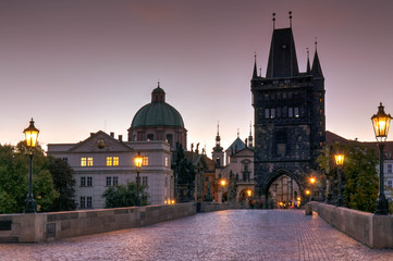 Naklejka na ściany i meble Panoramic morning view along Charles Bridge towards Old Town - Prague, Czech
