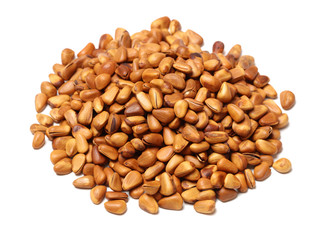 Pine nuts on white background