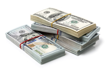 Many bundle of US 100 dollars bank notes isolated on white background 