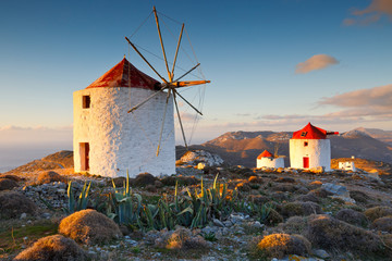 Traditional windmills near Chora village on Amorgos island in Greece.  - obrazy, fototapety, plakaty