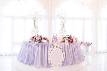 Colour photo of a wedding table for the newlyweds