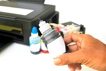 Four color printer on white background.