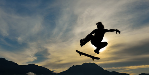 moving and dynamic man using skateboard