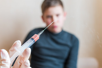 close-up of the syringe. vaccinations for children.