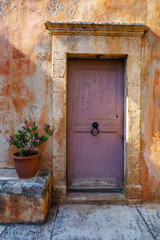 Fototapeta na wymiar Door in a monastery in Chania region on Crete island, Greece. 