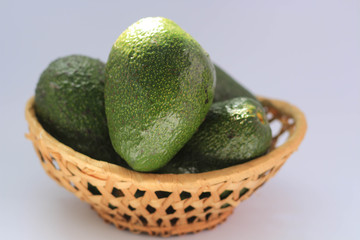 avocado in a basket