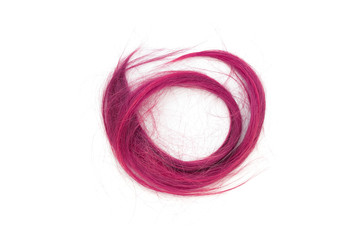 Cutted off pink hair on white background