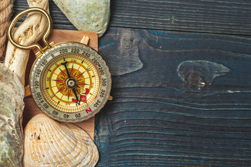 seashells and compass. beautiful sea composition with shells and vintage compass