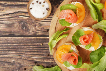 Sandwiches with salmon and cheese