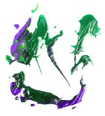 spot of green purple oil paint on a white background.