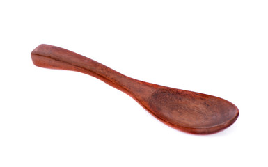 Wooden spoon isolated on white background